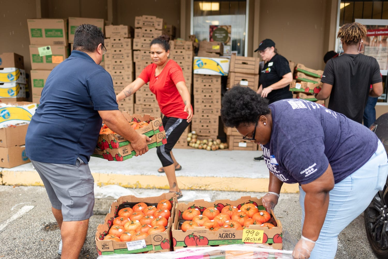 Programs like this mobile food pantry from United Way of Central Florida rely on volunteers to pack and distribute food to people in need. 