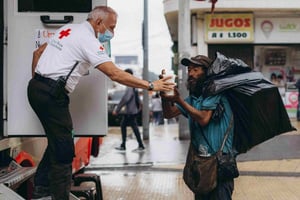 Volunteer work helping people in need is a great way to demonstrate compassion as both a quality and a skill on a resume. 