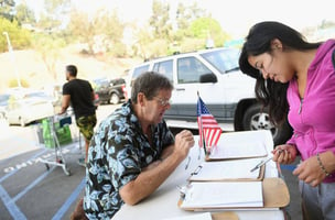 Woman signing a petition